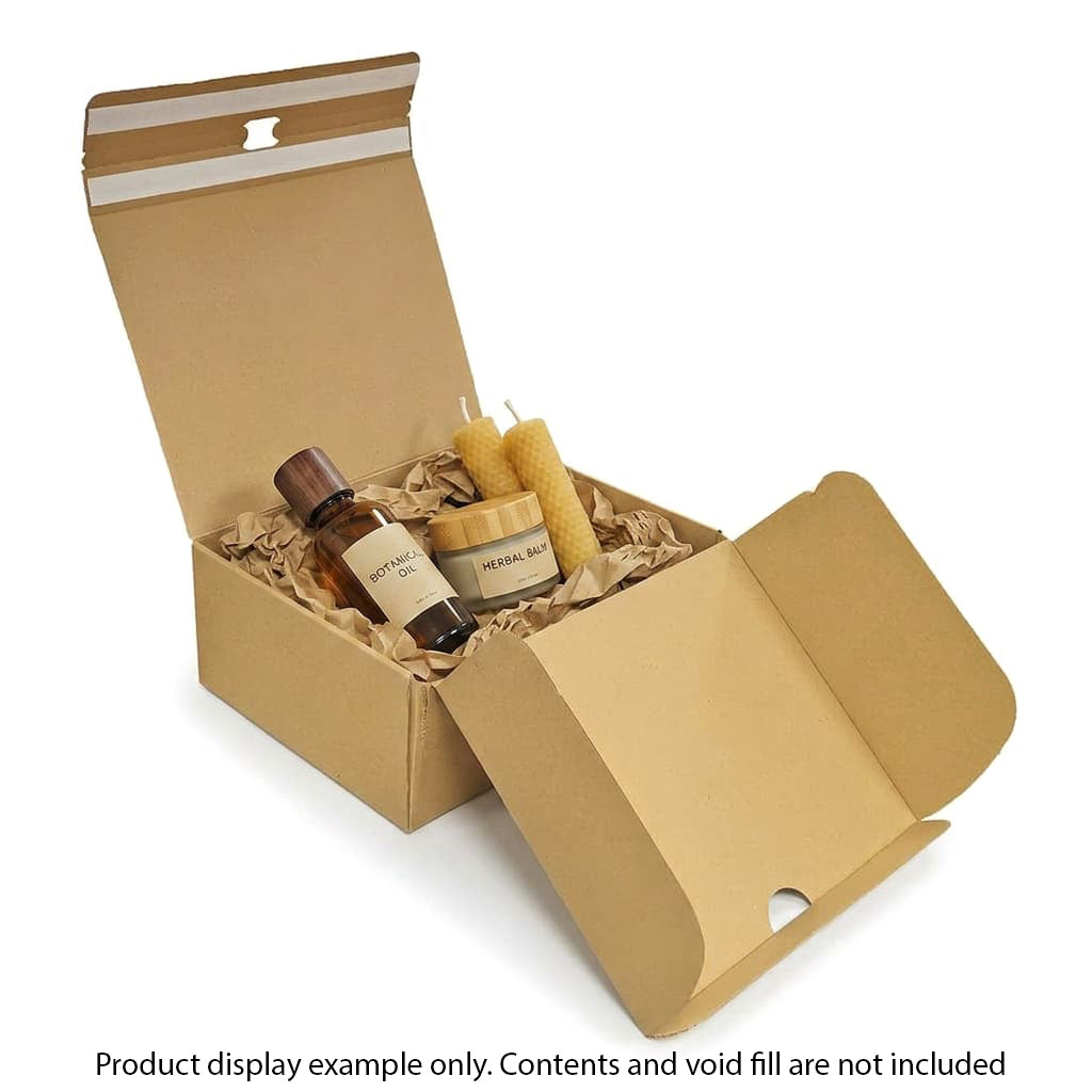 Open cardboard box with products inside on a white background
